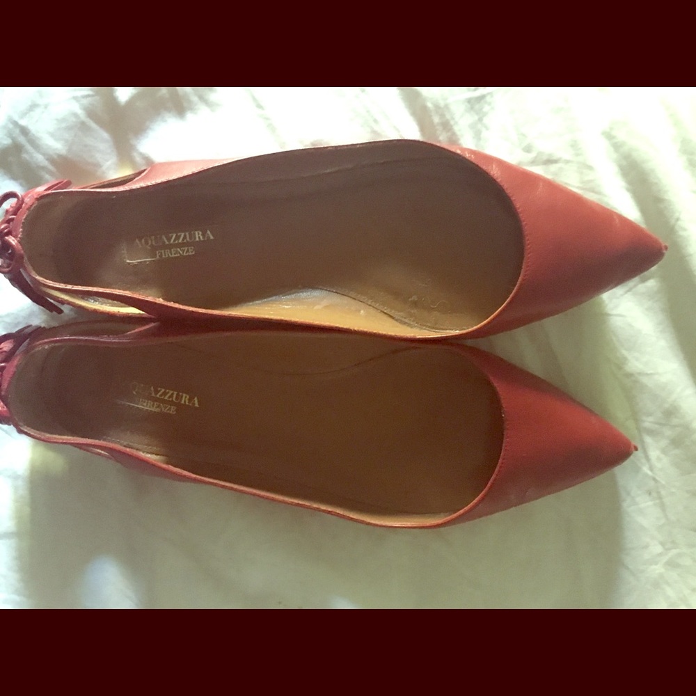 Red Aquaazura flats with tassels